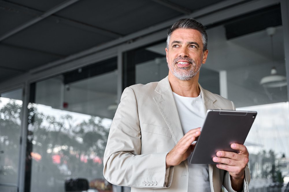 Business Man with Tablet_iStock-1552852723