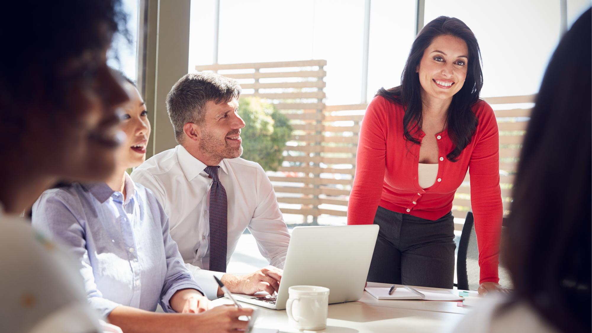 business people woman red sweater_crc-2