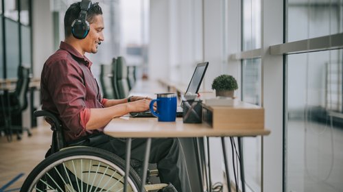 man in wheelchair_iStock-1319810505