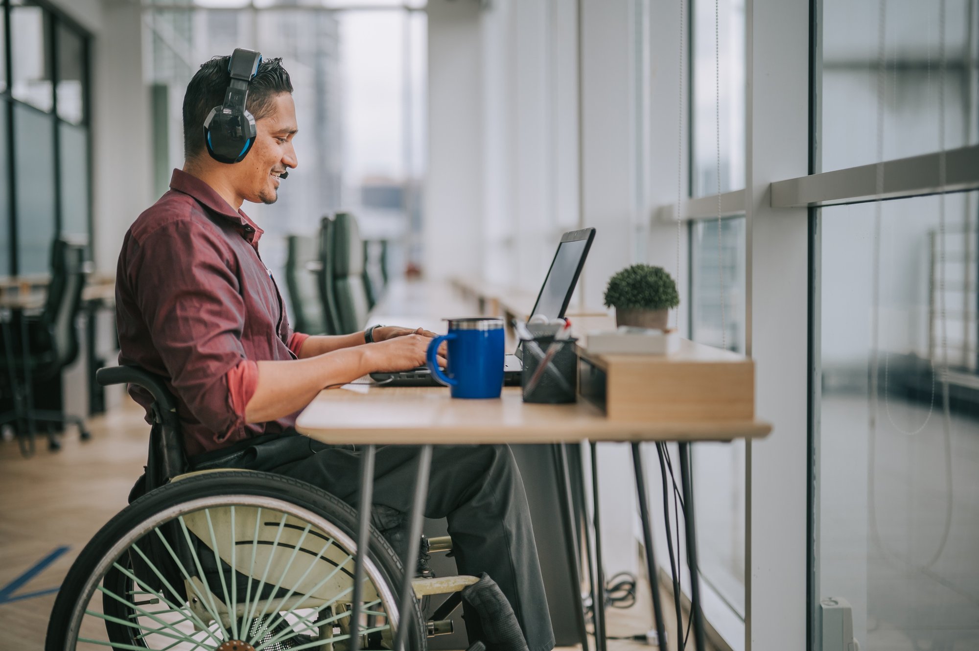 man in wheelchair_iStock-1319810505